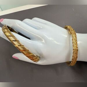 Pair of Gorgeous Monet Gold Bracelets one braided with clasp plus classic bangle